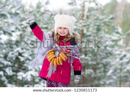 Happy Caucasian Girl in Winter Cloth Celebrating Pancake Snowy Forest Nature Outdoor
