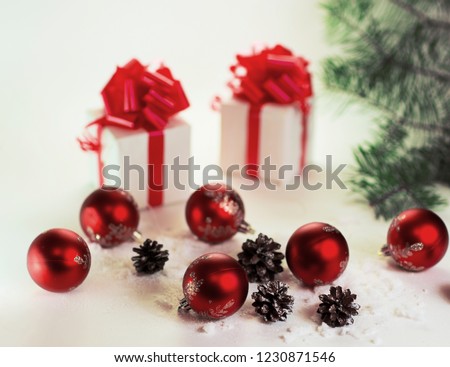 gifts on a white background with Christmas balls