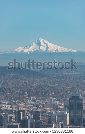 Mt Hood over Portland Oregon on a blue sky afternoon