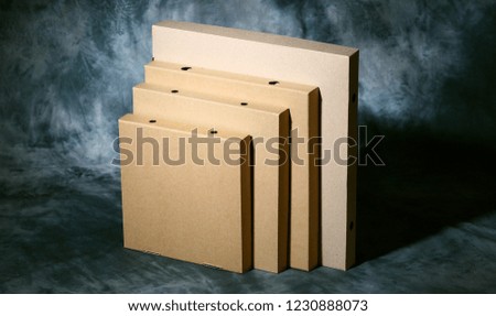 Shot of a set of different sized cardboard packaging