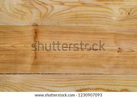 Planed pine Board with knots. Defects in wood processing, knots. Close-up photo.