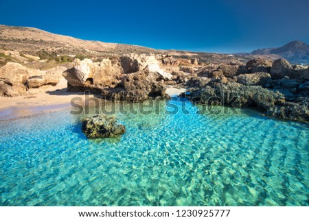 Falassarna beach on Crete island with azure clear water, Greece, Europe. Royalty-Free Stock Photo #1230925777