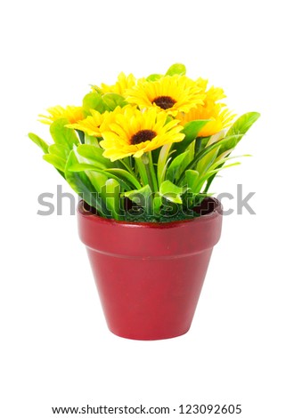 Artificial sunflowers with clay pot isolated on white background.