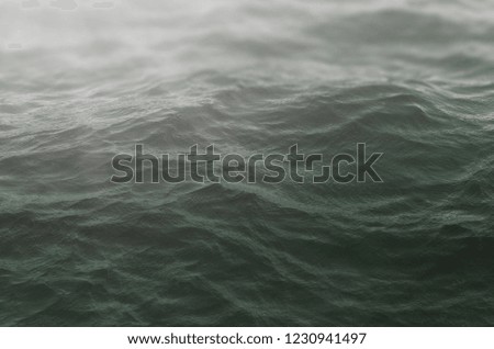 dramatic grey sea waves background. sea wave close up, low angle view
