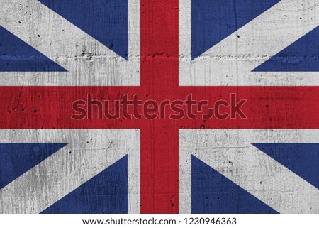 British flag on cement wall in grunge style.