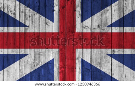 British flag on wood planks in grunge style.