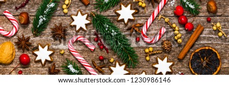 Christmas Background with Star Gingerbread Cookies and Holiday Decorations. Panoramic image. 
