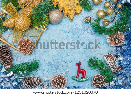 Christmas background with Christmas decorations. Floral decorations. blue background. Christmas decoration for postcards. Toned image. Plenty of copy space