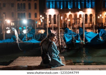 Beautiful Young Traveler Woman Taking Photos in Venice ,Italy