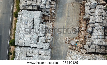 Plastic bottles,compressed into bales and ready for recycling aerial view