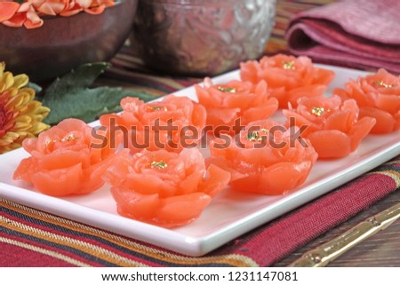 Royal Thai cuisine / Thai desserts : Pink-gold flowers sweetmeat (Thong Chompoo Nuch), Famous auspicious desserts for celebration Thai tradition wedding party.