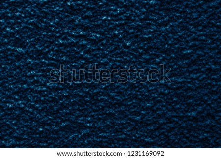 Cold snowy icy dark blue background. Cold winter weather texture. Dark snowflakes abstract background 