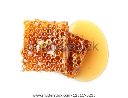 Fresh honeycombs on white background, top view Royalty-Free Stock Photo #1231195213