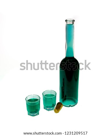 Green Chacha alcoholic beverage isolated against white background.