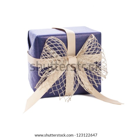 blue gift box with gold ribbon on white background