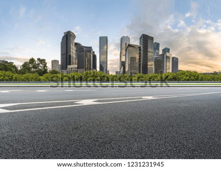 empty asphalt road with city skyline background in china
