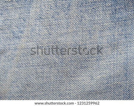 Denim background texture for design. Jeans texture, denim fabric. Blue jeans texture for any background.