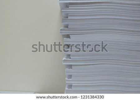 Pile of unfinished documents on office desk folders. Business papers or document is written. Business offices concept.