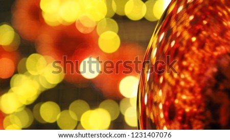 Fantasy blurred background with red and yellow bokeh defocused lights of joyful Christmas night, happy new year 2019, holidays party theme. (space for text or abstract background for design)
