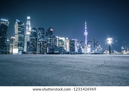Shanghai, China :Nightscape of Lujiazui skyline as seen from the Bund, across the Huangpu River, with the Shanghai Tower.