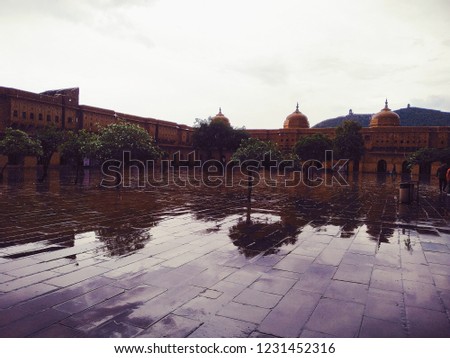 Picture of the reflection of Amer Fort at dusk in rainy weather in jaipur , India 