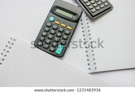 calculator and notebook