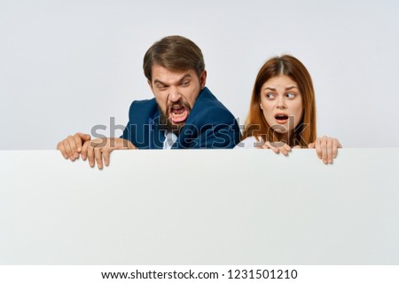 man and woman push each other backs over white mockup                       