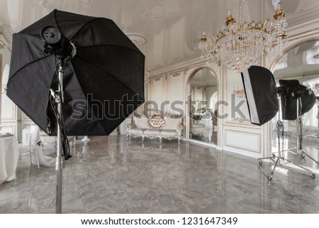 Photo Studio interior. classic luxurious apartments with a white fireplace, sofa 