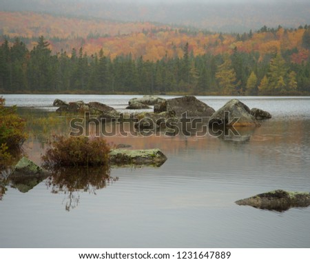 Pond with foggy hills in Baxter State Park Maine. 