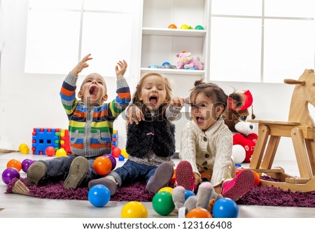 Kids playing in the room Royalty-Free Stock Photo #123166408