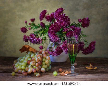 Still life with bouquet of  a purple chrysanthemums