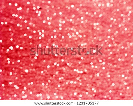 abstract red background colorful blurred christmas light garland snow