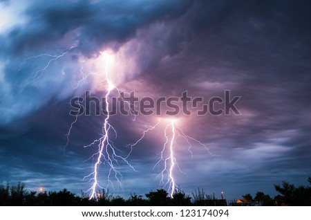 clouds and thunder lightnings and storm Royalty-Free Stock Photo #123174094