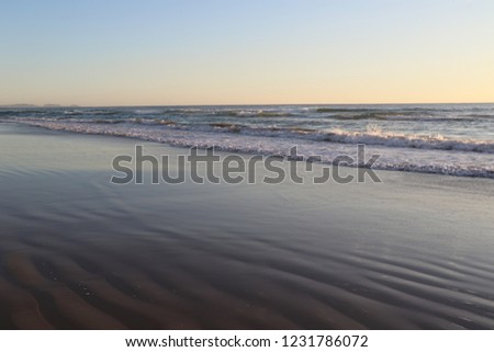 Subtle colours of the morning light on Tyagarah Beach, Australia