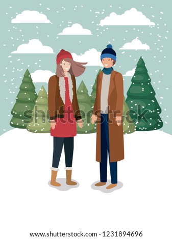 couple in snowscape with winter clothes