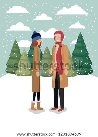 couple of women in snowscape with winter clothes