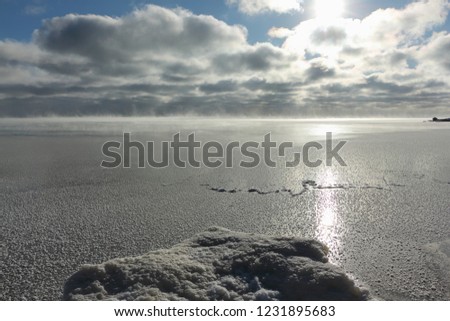 Evaporation during the freezing of water in the river,  formation of ice, Ob reservoir, Siberia, Russia 