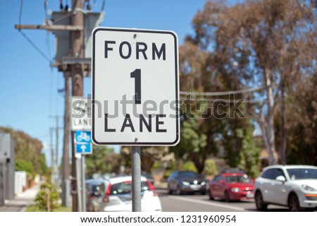 Road sign. Form lane. Australia, Melbourne.