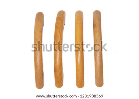 wooden handles for cabinets and drawers on a white background.