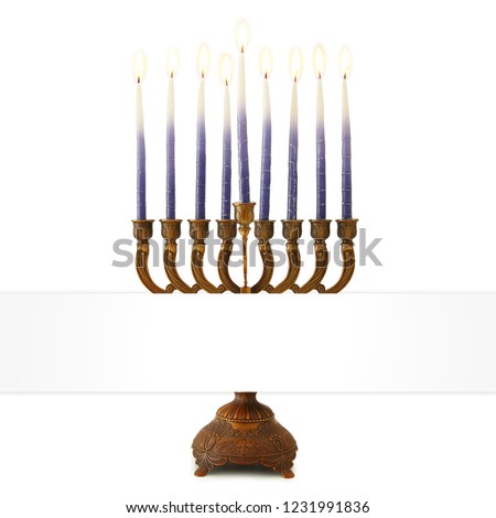 image of jewish holiday Hanukkah with menorah (traditional candelabra) isolated on white.