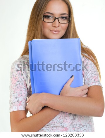 Young beautiful business woman holding files