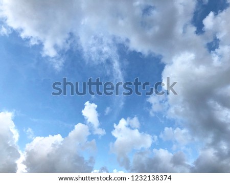 White clouds spread in the air.Blue sky and group white clouds background.