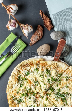 Appetizing pizza. Restaurant table setting. p view.