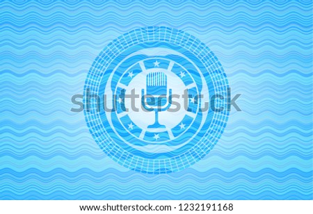 microphone icon inside light blue water badge.