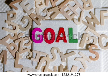 GOAL concept, colourful wooden text word "goal"