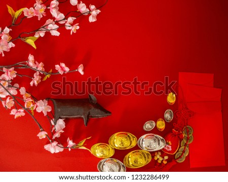 Chinese new year's decoration for Spring festival on red background with assorted festival. Empty space for design. flat lay. minimal (Chinese character "fu" means fortune)