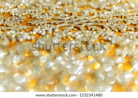 Christmas golden background with snowflakes