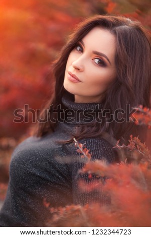 Autumn Woman Portrait. Beauty Fashion Model Girl with Autumnal Make up. Fall.