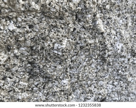 Rock background, black and white stone texture, rock wallpaper. 