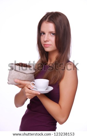 Pretty woman holding sack coffee beans and white coffee cup on Food and Drink theme